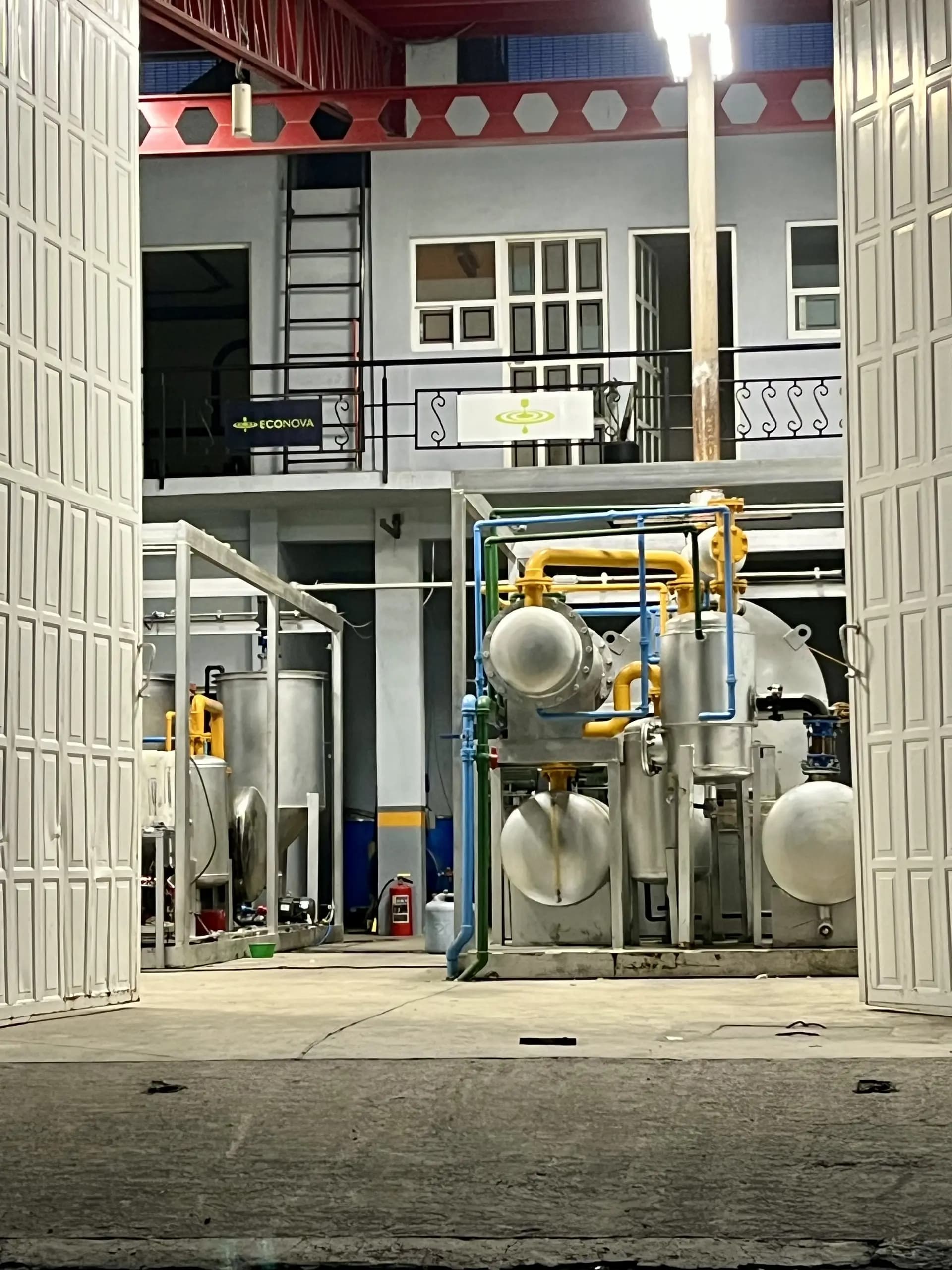 EcoNova plant in Lerma, Mexico, seen through the open gate at night